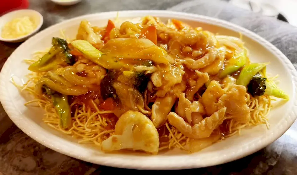 Crispy Chicken Chow Mein: Your Perfect Companion for Saskatoon's Concert Nights & Winter Olympic Views at Dragon Emperor Dim Sum